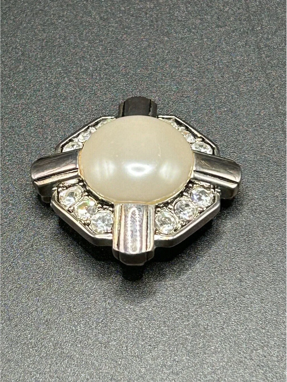vintage 1950s fm silver tone pearl color center surrounded by rhinestones brooch